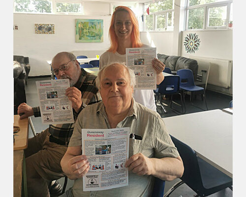 Queensway residents wth newsletter image
